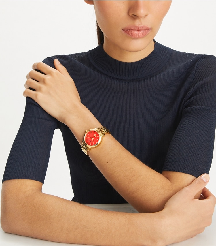 Tory Burch designer strap watches T Monogram Watch in CORAL/GOLD accessory on model