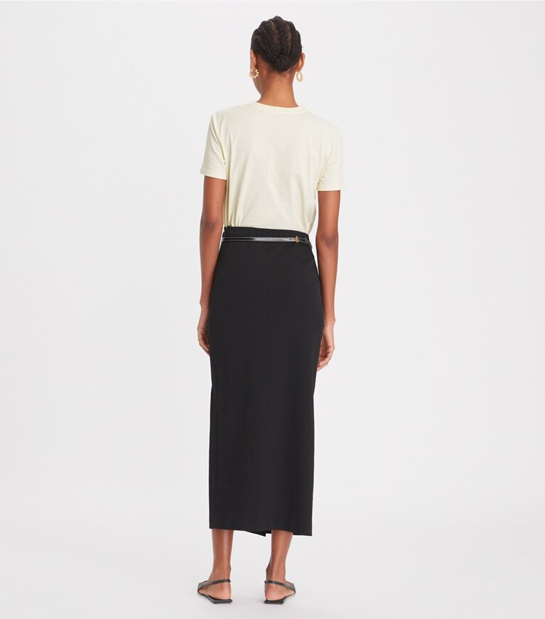 Tory Burch designer hauts T-shirt à logo en dentelle dans New Ivory sur modèle, de dos