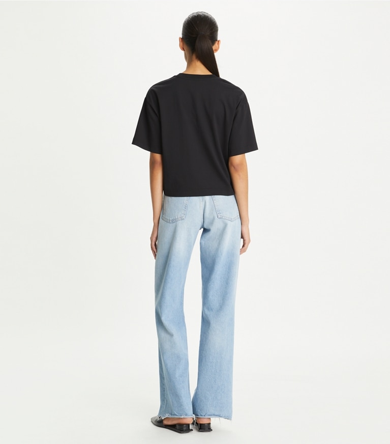 Tory Burch designer tops T-shirt ampia con logo in Black front