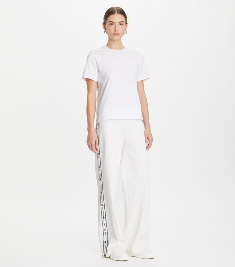 Tory Burch designer tops T-shirt in cotone Sublime in White Sublime parte anteriore su modella