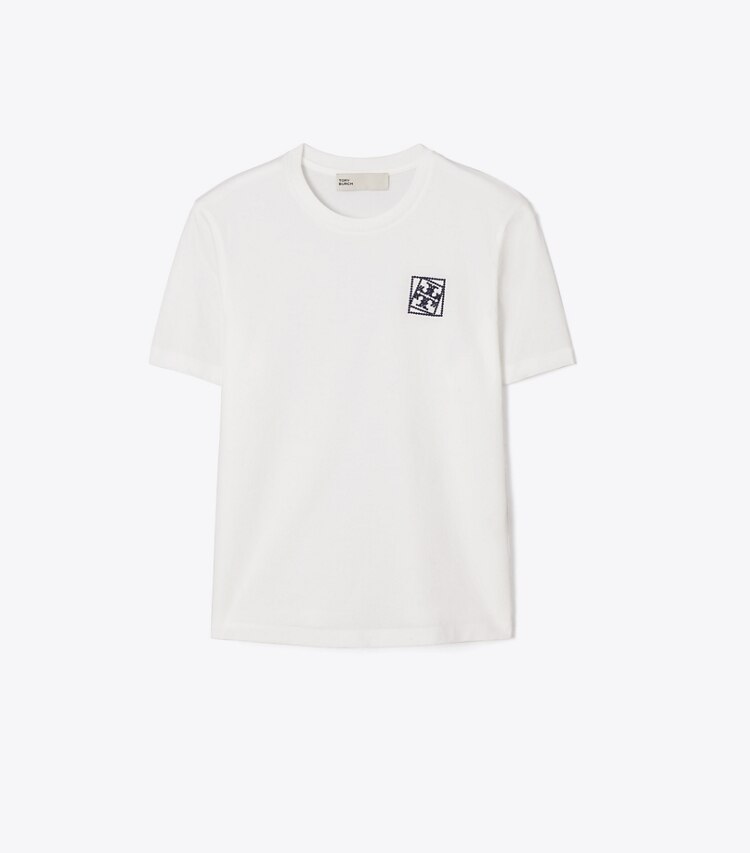 Tory Burch designer hauts T-shirt torsadé à logo dans Snow White de face