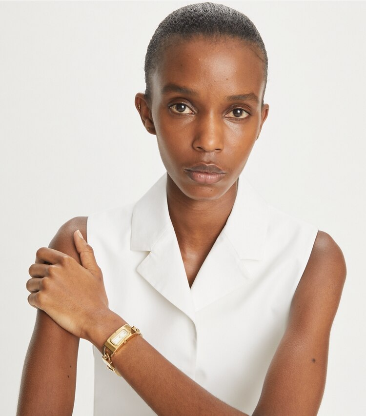 Tory Burch designer strap watches T Watch in IVORY/GOLD accessory on model