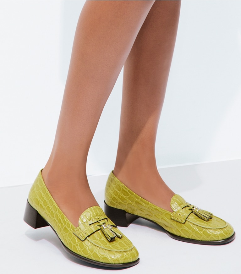 Tory Burch designer flats Tassel Loafer in AVOCADO accessory on model