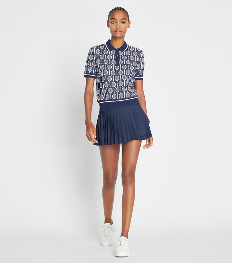 Tory Sport designer sweaters Tech Knit Polo in Tory Navy Racquets on model front