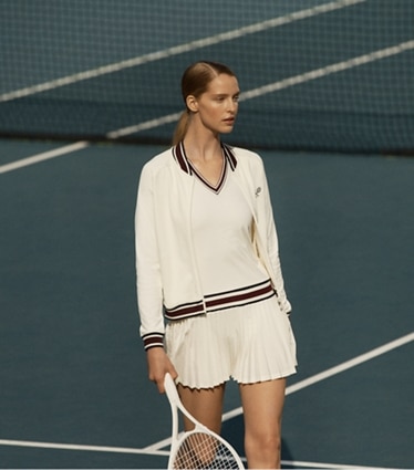 Tory Sport designer jackets Tech Knit Tennis Jacket in Snow White campaign