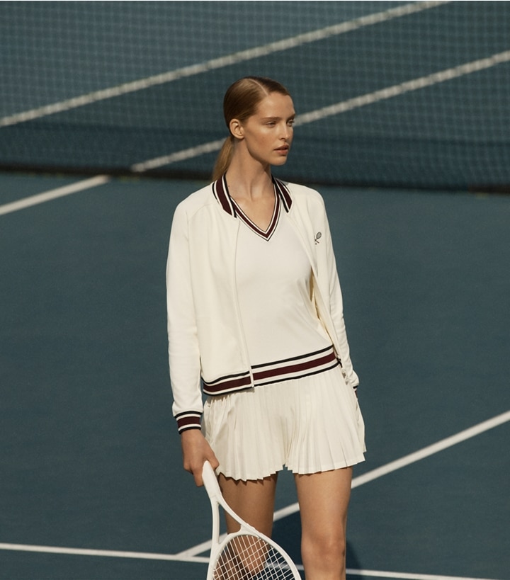 Tory Sport designer jackets Tech Knit Tennis Jacket in Snow White campaign