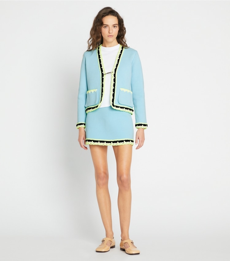 Tory Sport designer bottoms Tech Knit Viscose Mini Skirt in Vista on model front