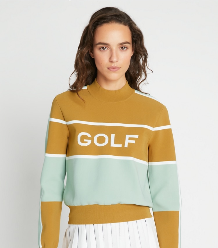 Tory Sport designer sweaters Tech Nylon Golf Cropped Sweater in Ridge / Sage Leaf on model detail