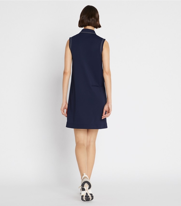Tory Sport designer dresses Tech Piqué Pick Stitch Golf Dress in Tory Navy on model back