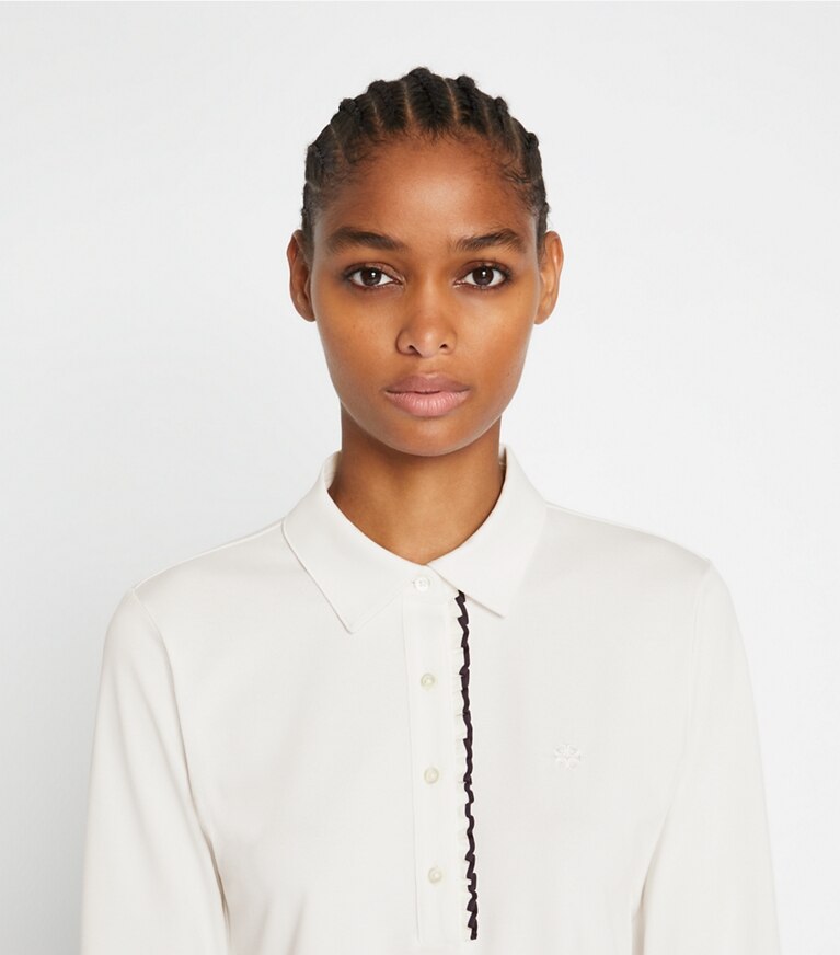 Tory Sport designer tops Tech Piqué Ruffle Long Sleeve Polo in Snow White / Tory Navy front
