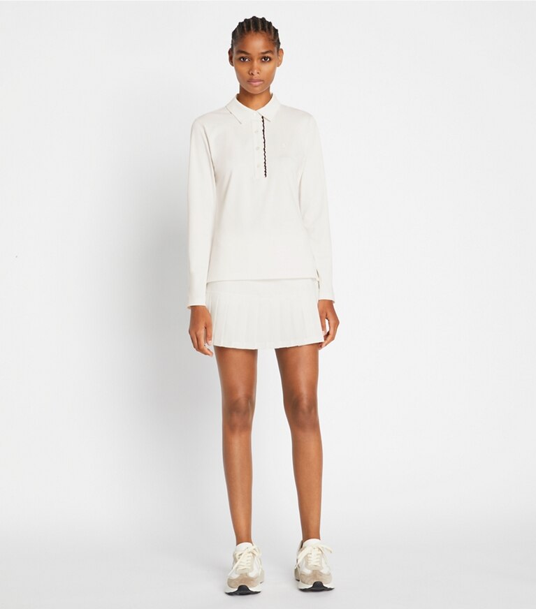 Tory Sport designer tops Tech Piqué Ruffle Long Sleeve Polo in Snow White / Tory Navy front