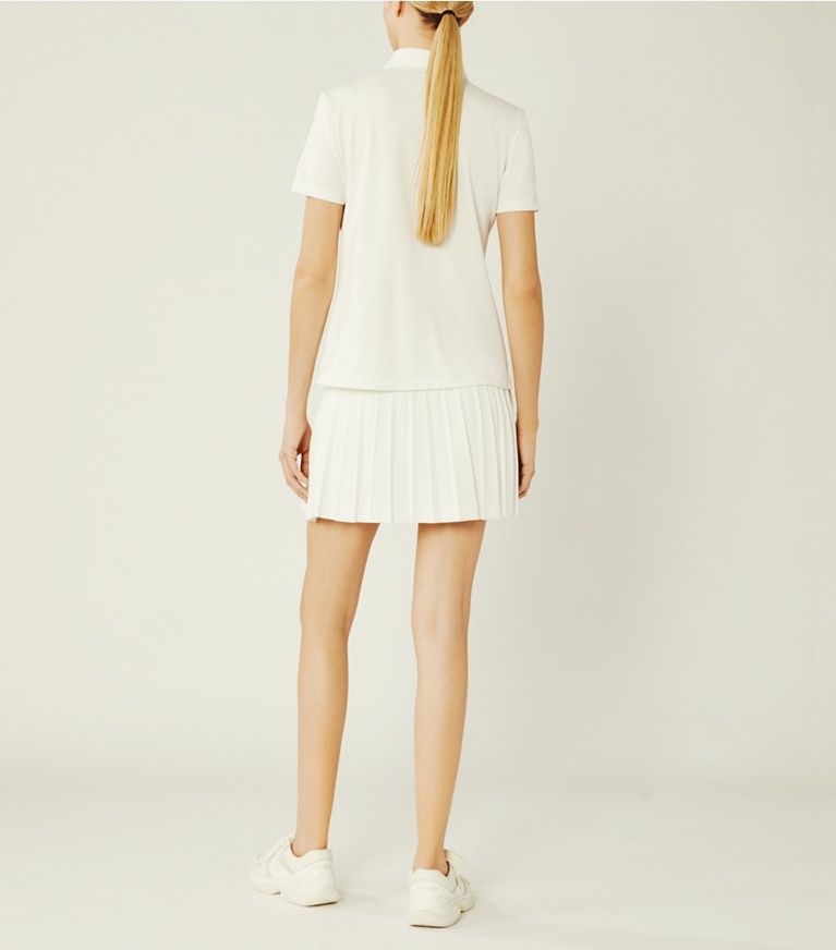 Tory Sport designer tops Tech Piqué Ruffle Polo in Snow White front