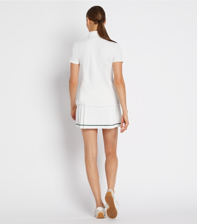 Tory Sport designer tops Tech Piqué Ruffle Polo in Snow White front
