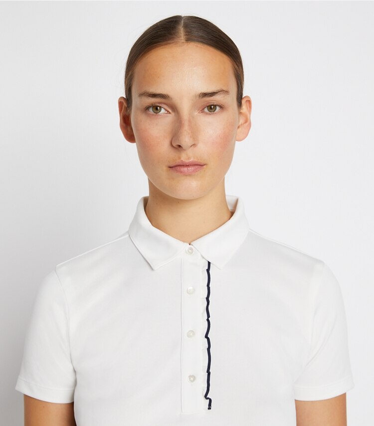 Tory Sport designer tops Tech Piqué Ruffle Polo in Snow White on model detail