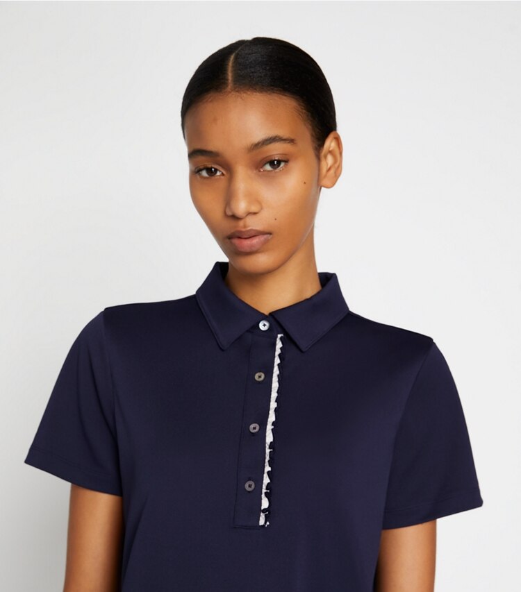 Tory Sport designer tops Tech Piqué Ruffle Polo in Tory Navy on model detail