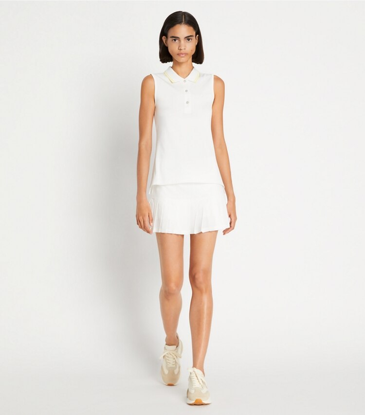 Tory Sport designer tops Tech Piqué Sleeveless Polo in Snow White / Lemon Glow on model front