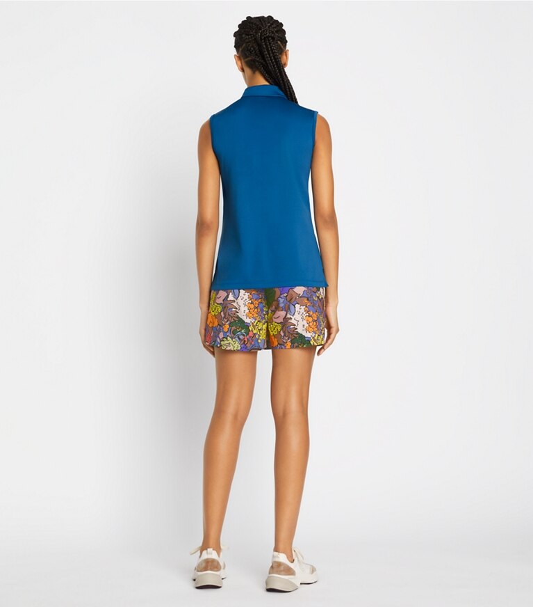 Tory Sport designer tops Tech Piqué Sleeveless Ruffle Polo in Blue Wash / Snow White front