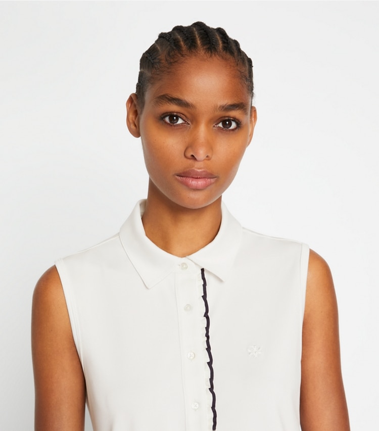 Tory Sport designer tops Tech Piqué Sleeveless Ruffle Polo in Snow White on model detail