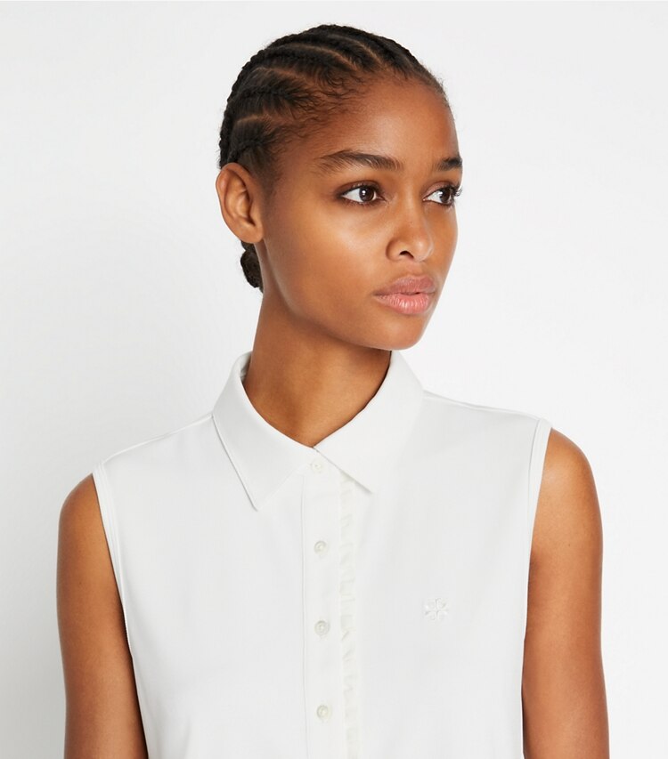 Tory Sport designer tops Tech Piqué Sleeveless Ruffle Polo in Snow White / Snow White on model detail