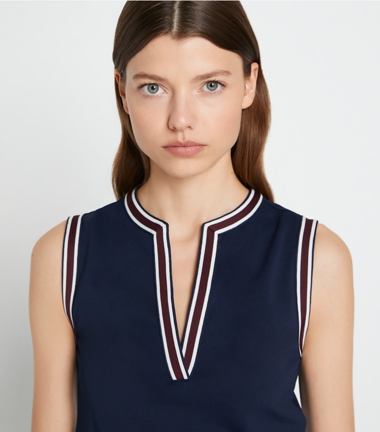 Tory Burch designer tops Tech Piqué Tunic Tank in Tory Navy / Winetasting on model detail