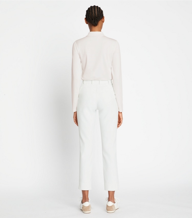 Tory Sport designer bottoms Tech Twill Golf Pant in Snow White on model back