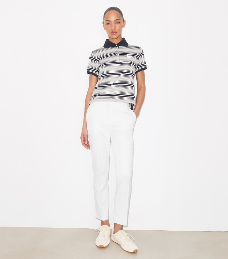 Tory Burch designer bottoms Tech Twill Golf Pant in Snow White on model front