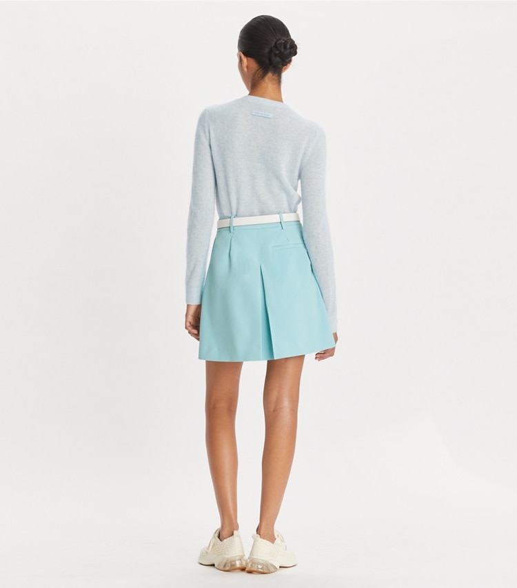 Tory Sport designer bottoms Tech Twill Golf Skirt in Pastel Sky on model back