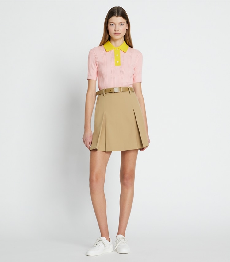 Tory Sport designer bottoms Tech Twill Golf Skirt in Pale Teak on model front