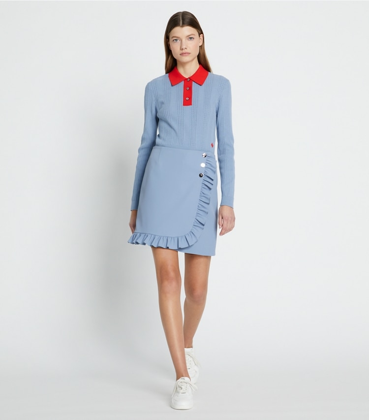 Tory Sport designer bottoms Tech Twill Ruffle Golf Skirt in Seafaring on model front