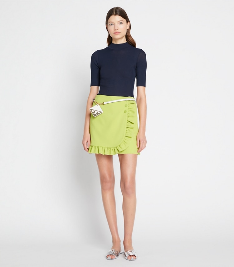 Tory Sport designer bottoms Tech Twill Ruffle Skort in Bright Chartreuse on model front