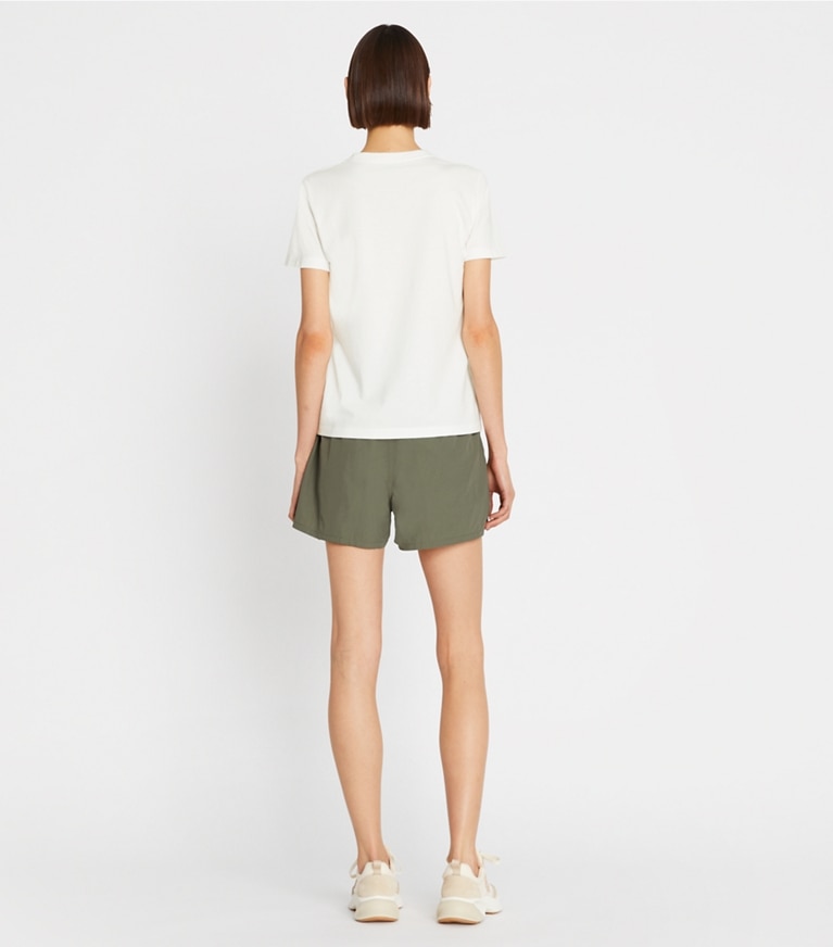 Tory Sport designer tops Tempo Chevron T-Shirt in Snow White / Conifer front