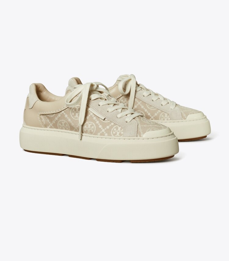 Tory Burch diseñador zapatillas Tenis con monograma de T Ladybug en BIRCH / NEW CREAM / CALCARE ángulo