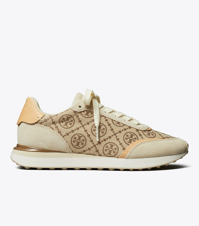 Tory Burch diseñador zapatillas Tenis Destiny con monograma de T en HAZEL / RIVER ROCK lateral