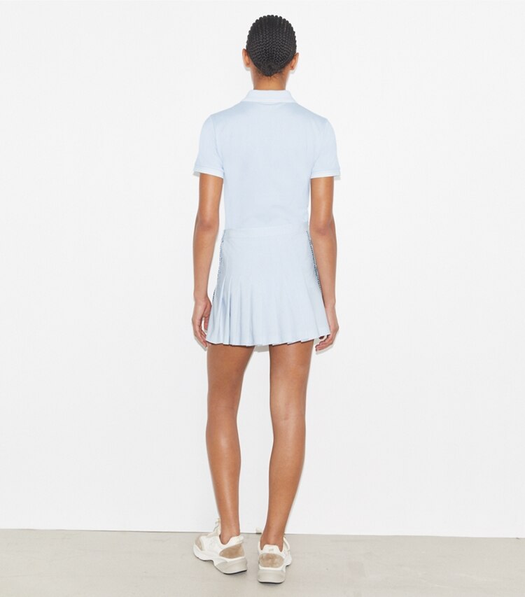 Tory Burch designer oberteile Tennis-Poloshirt aus Funktionspiqué in Light Blue  / Snow White on model back