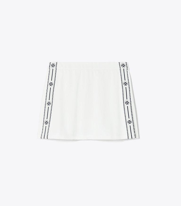 Tory Sport designer unterteile Tennisrock aus Funktions-Piqué mit Seitenschlitz in Snow White front