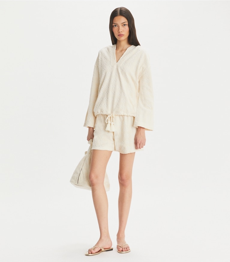 Tory Burch designer カバーアップ テリージャカード ロゴ フーディ in NEW IVORY front