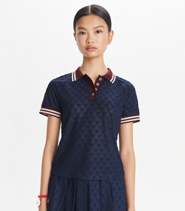 【新品未使用】Tory Burch ネイビースカート tory sports Tモノグラム テックジャカード スカート: レディース ボトムス