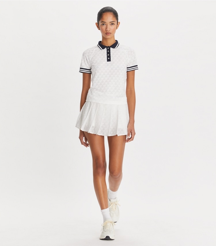Tory Sport designer tops Terry Jacquard Polo in Snow White on model front