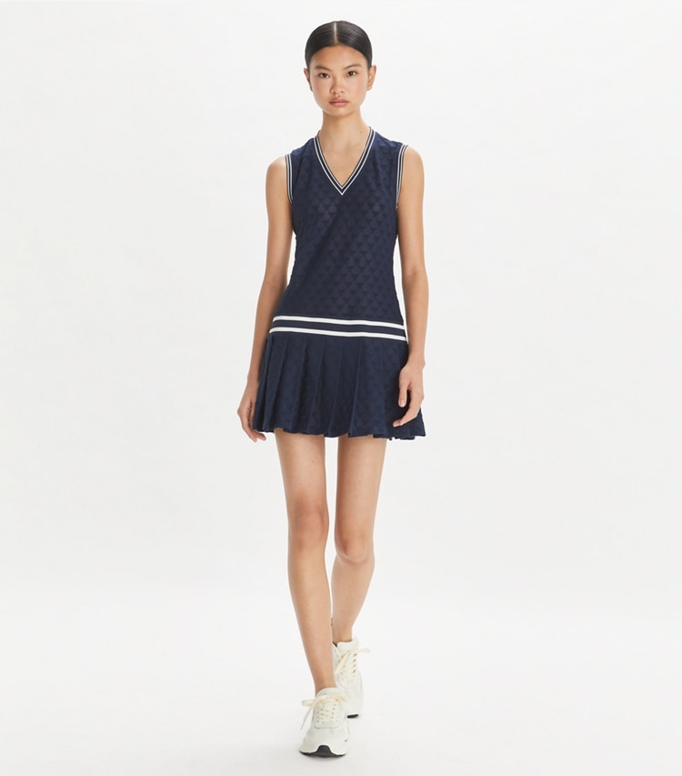 Tory Sport designer dresses Terry Jacquard Tennis Dress in Tory Navy on model front
