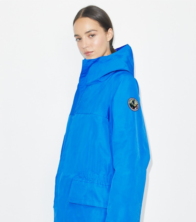 Tory Burch designer jackets The Explorers Club Tech Canvas Hooded Jacket in Bay Blue additional on model