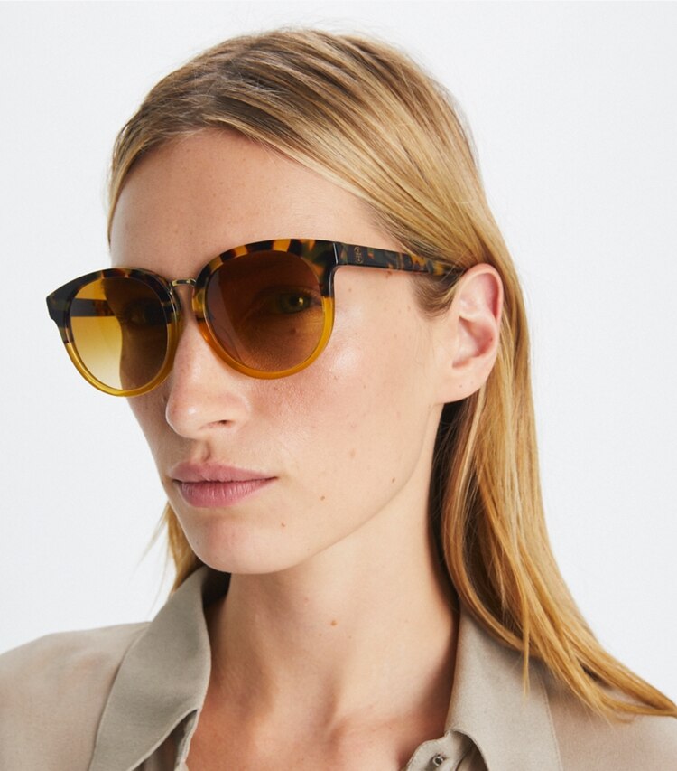 Tory Burch designer sunglasses & eyewear The Reva Color-Blocked Tortoise Sunglasses in AMBER TORTOISE accessory on model