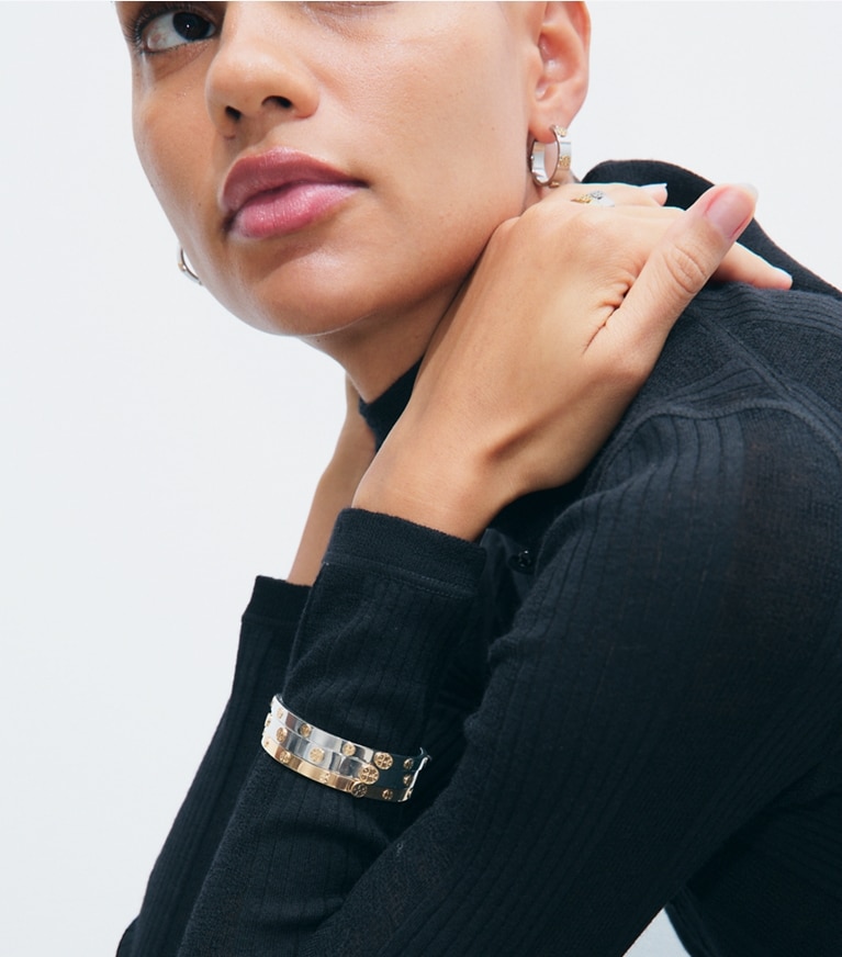 Tory Burch designer bracelets Thin Icon Hinge Bracelet in Tory Gold additional on model