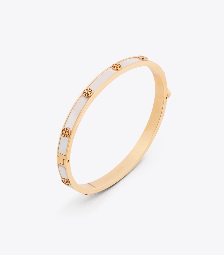 Tory Burch diseñador pulseras Thin Icon Mother Of Pearl Hinge Bracelet en Tory Gold / Mother of Pearl detalle