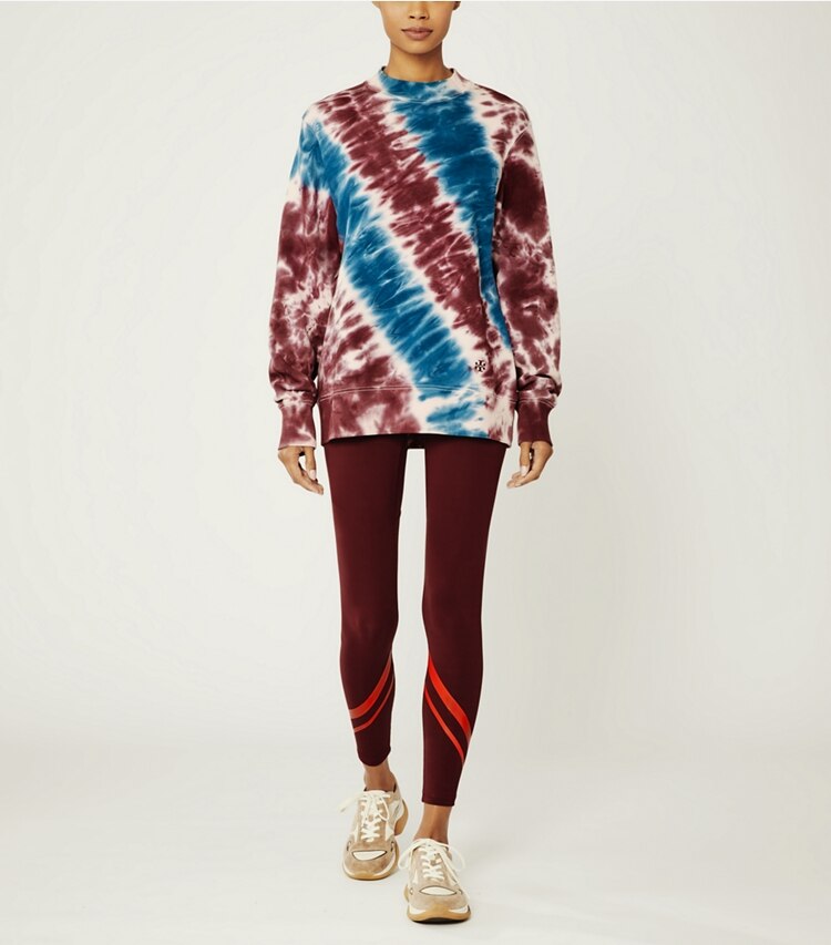 Tory Sport designer sweaters Tie-Dye French Terry Crew in Cotton Pink/Tory Navy Tie Dye on model front