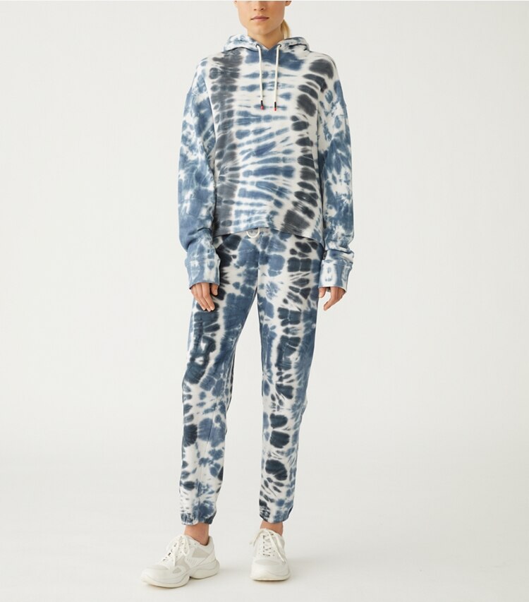 Tory Sport designer sweaters Tie-Dye French Terry Hoodie in Tory Navy, Sport Black Tie Dye on model front