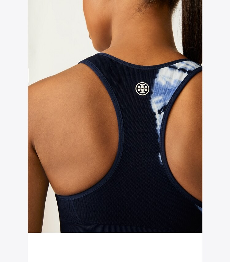 Tory Sport designer sports bras Tie-Dye Seamless Racerback Bra in Tory Navy Tie Dye Sun on model detail