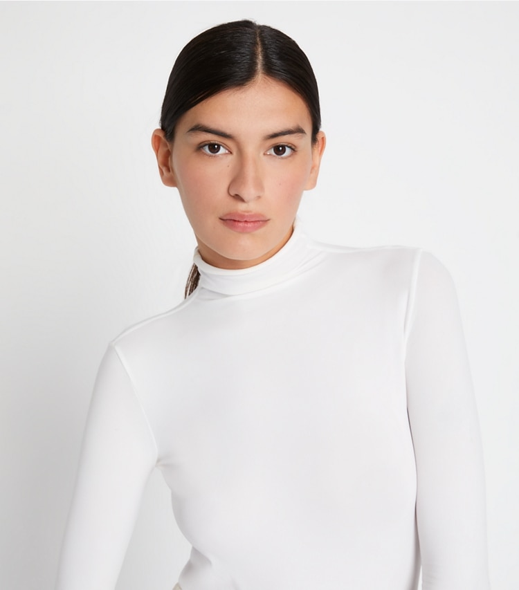 Tory Sport designer tops Tissue-Seamless Long-Sleeve Mockneck in Optic White on model detail