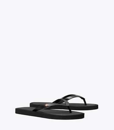 Tory Burch designer sandales Tongs Kira à semelle amortissante in PERFECT BLACK / GOLD angle