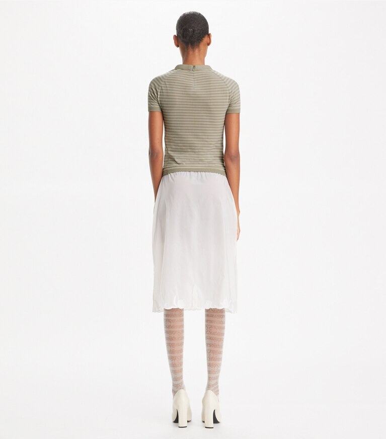 Tory Burch designer sweaters Top à col montant en nylon rayé in Gray Chateau front