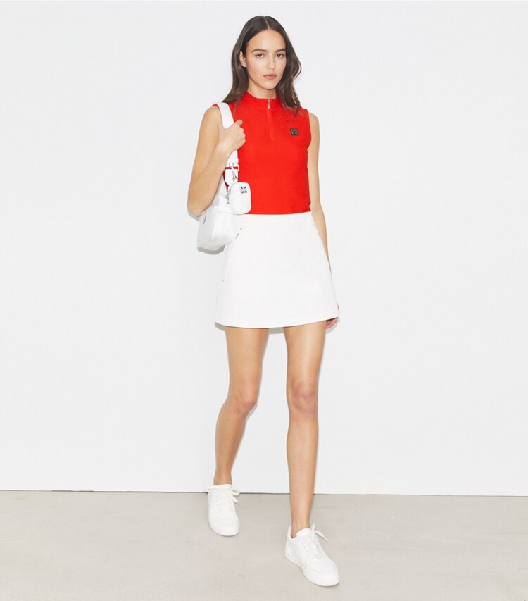 Tory Sport designer tops Top con zip in poliestere in Blazing Red parte anteriore su modella